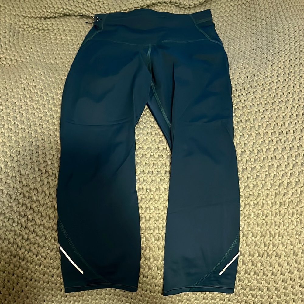 All in Motion.. dark green/blue high-waisted cropped leggings.